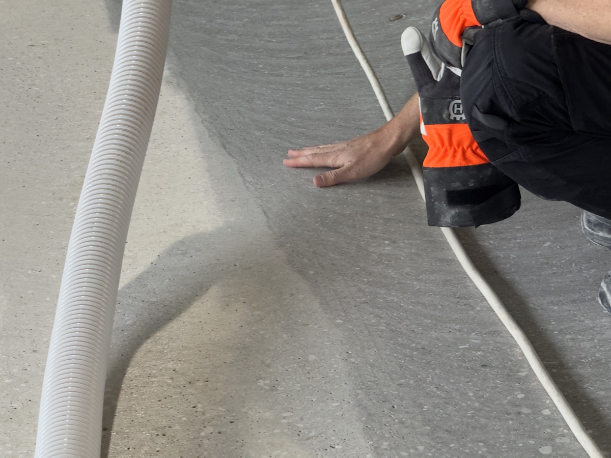 Close-up of Husqvarna grinding machine in action